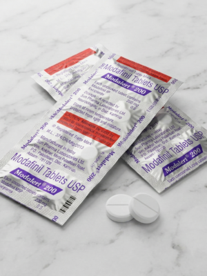 Два сріблясті блістери modalert 200 мг (Модафініл) по 10 таблеток від Sun Pharma