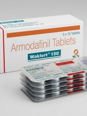 Препарат Waklert 150 мг: картонна упаковка та стопка з п'яти срібних блістерів Армодафінілу від Sun Pharma на світлому фоні