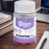 memory-supplements-modafinil-kyiv-en Bottle of nootropic complex on a desk near a laptop. Effective memory supplements and brain focus pills, fast delivery modafinil kyiv.