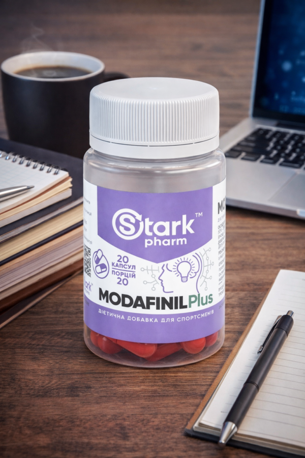 memory-supplements-modafinil-kyiv-en Bottle of nootropic complex on a desk near a laptop. Effective memory supplements and brain focus pills, fast delivery modafinil kyiv.